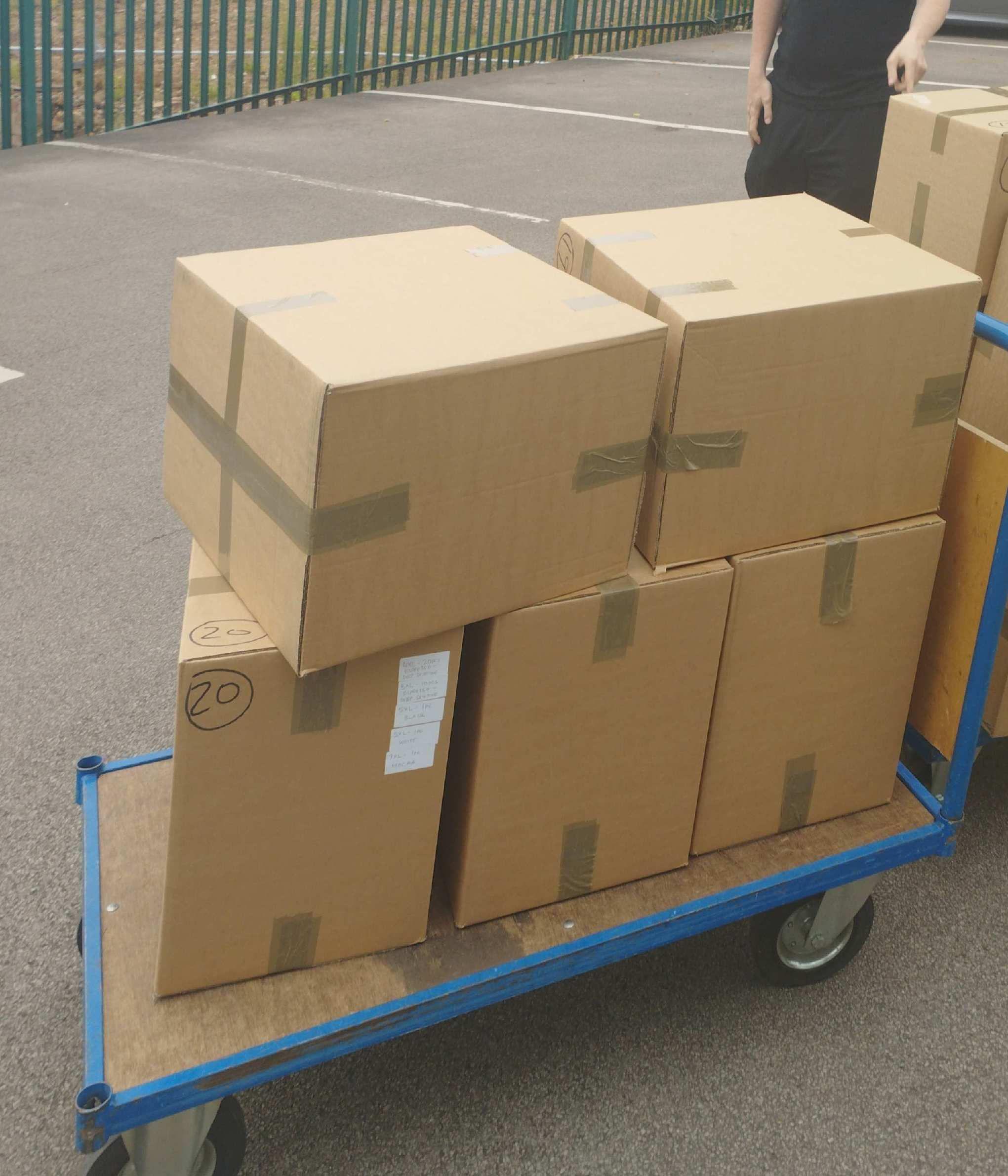express couriers parcels on delivery trolley