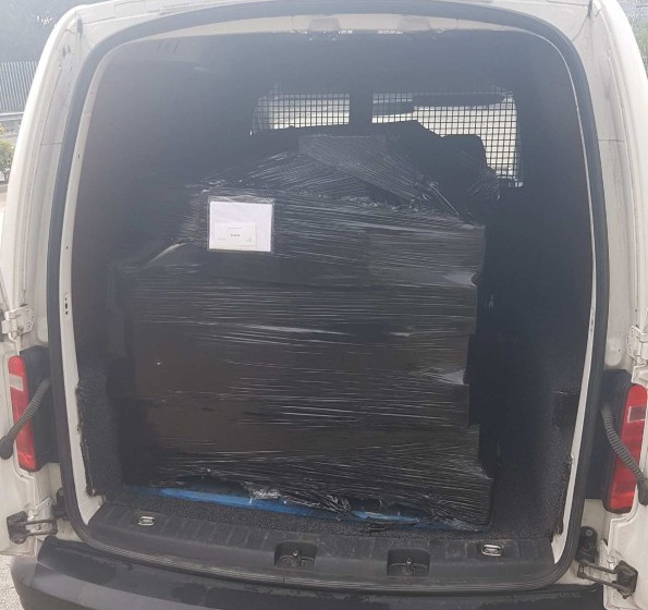 pallet loaded onto small nextday courier van
