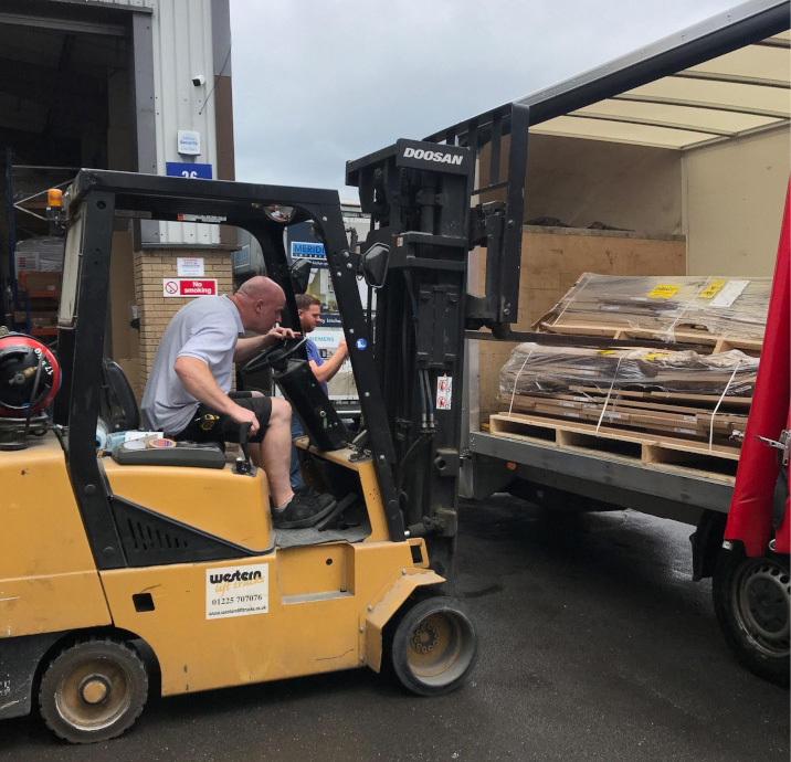 pallets-loaded-onto-truck-with-forklift